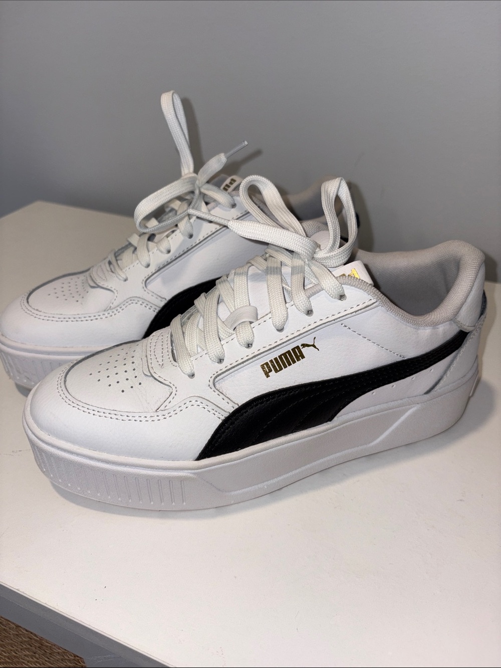 Puma White Platform Sneakers with Black Formstripe and Gold Logo